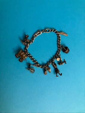 Vintage/antique charm bracelet 8 charms working parts Pinocchio